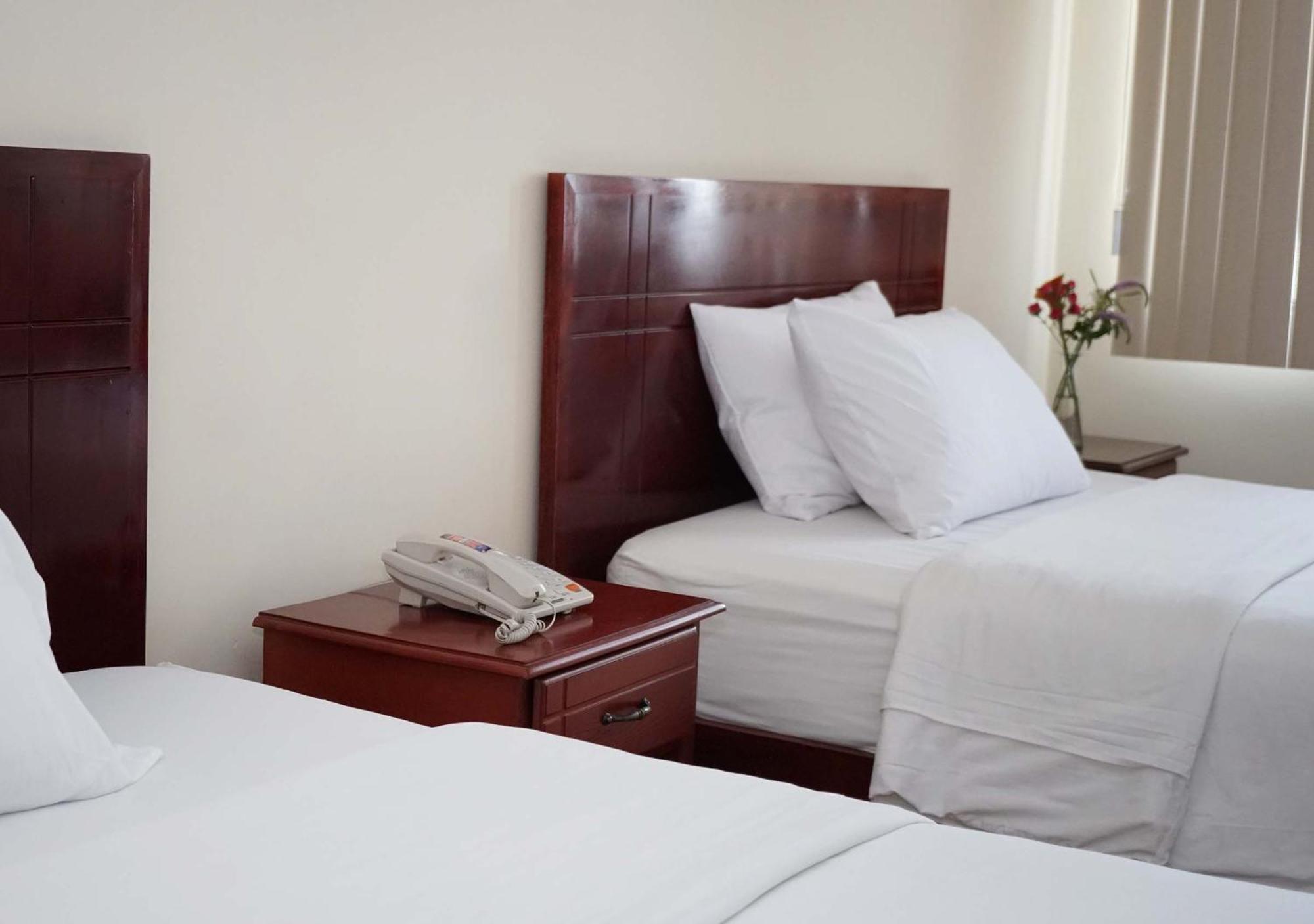 Hotel Lottus Quito Quarto foto